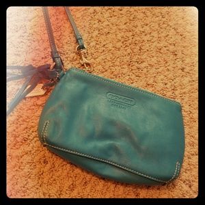 Teal blue Coach wristlet